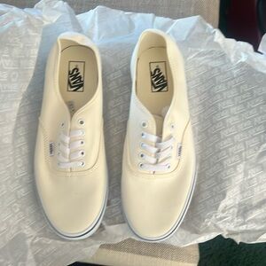 Brand new men’s size 10.5 vans in classic white( it’s more like a cream